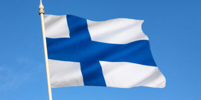 Flag of Finland The flag of Finland dates from the beginning of the 20th century. On a white background, it features a blue Nordic cross, which represents Christianity.